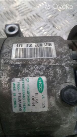 KIA Venga Ilmastointilaitteen kompressorin pumppu (A/C) 977012K001