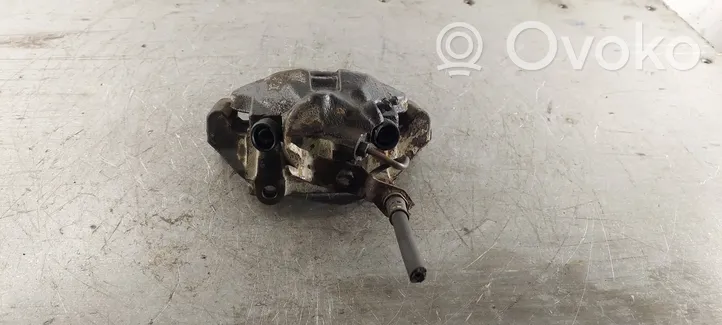 Volkswagen PASSAT B5 Caliper de freno delantero 