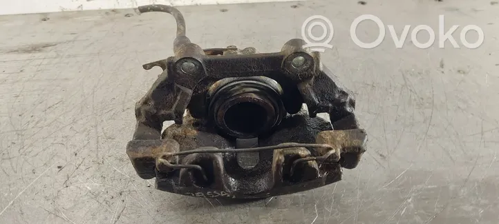 Volkswagen PASSAT B5 Caliper de freno delantero 