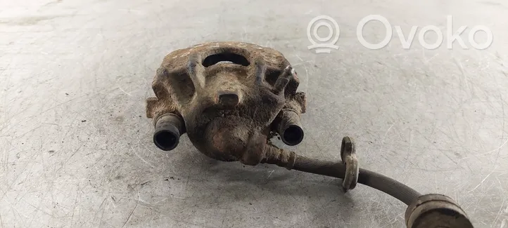 Volkswagen Golf II Front brake caliper 