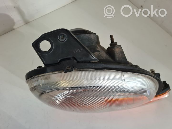 Renault Kangoo I Lampa przednia 7700308025