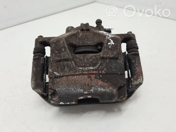 Opel Astra J Caliper de freno delantero 