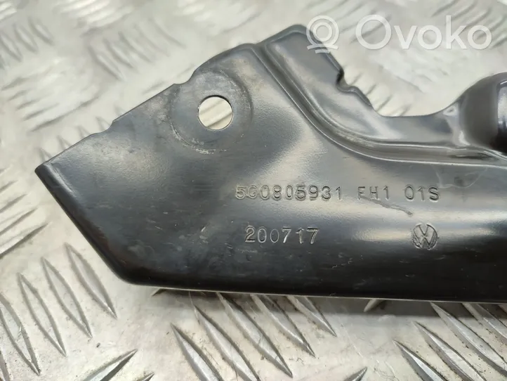 Volkswagen Golf VII Uchwyt / Mocowanie lampy przedniej 5G0805931