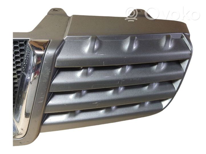 Nissan Qashqai Maskownica / Grill / Atrapa górna chłodnicy 62310JD000