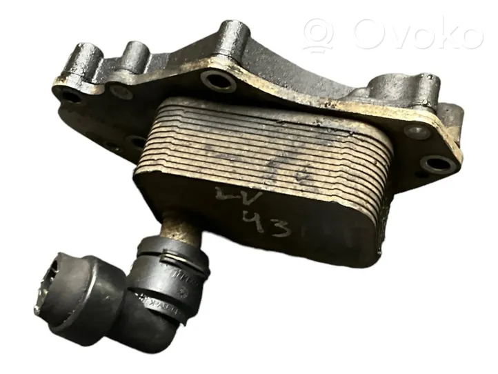 Opel Astra J Supporto di montaggio del filtro dell’olio 55573795