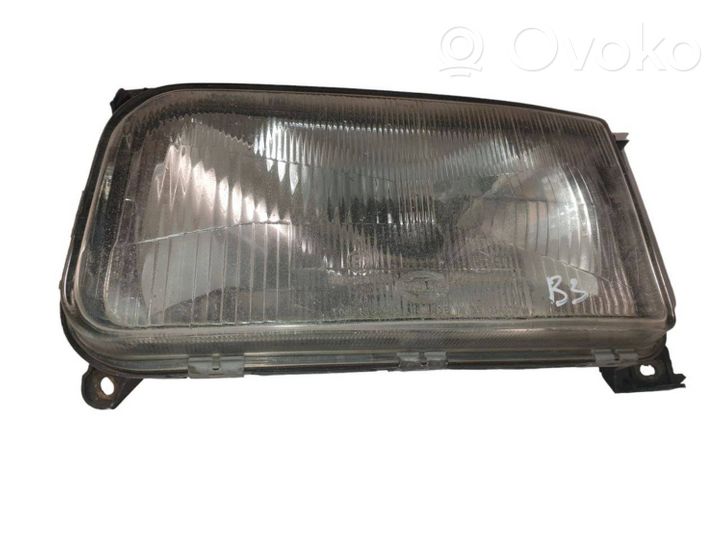 Volkswagen PASSAT B3 Lampa przednia 13347900