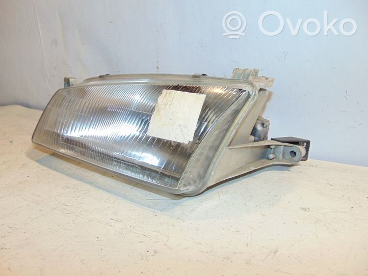 KIA Clarus Lampa przednia 0K9AA51040C