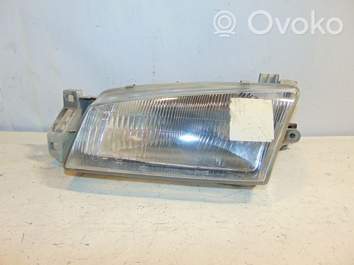 KIA Clarus Lampa przednia 0K9AA51040C