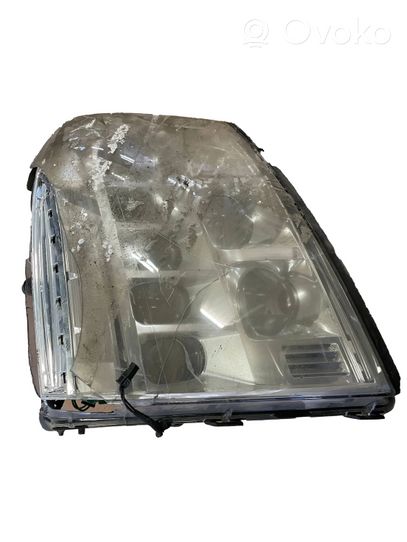 Cadillac Escalade Lampa przednia 25999510RH