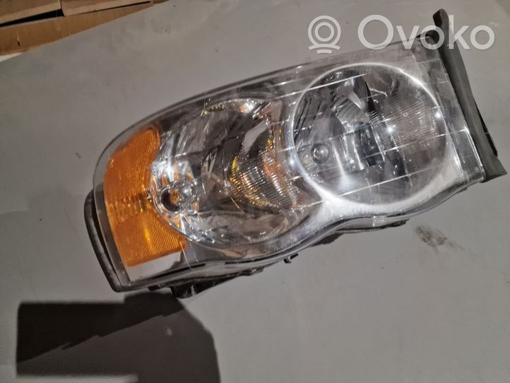 Dodge RAM Lampa przednia 55077120A