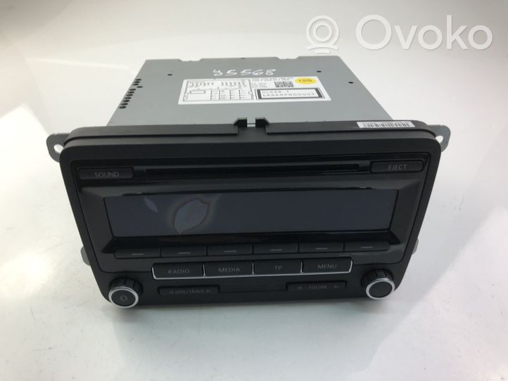 Volkswagen Jetta IV Panel / Radioodtwarzacz CD/DVD/GPS 1K0035186AN