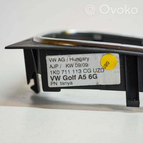 Volkswagen Golf VI Vaihteenvalitsimen kehys verhoilu muovia 1K0711113CG