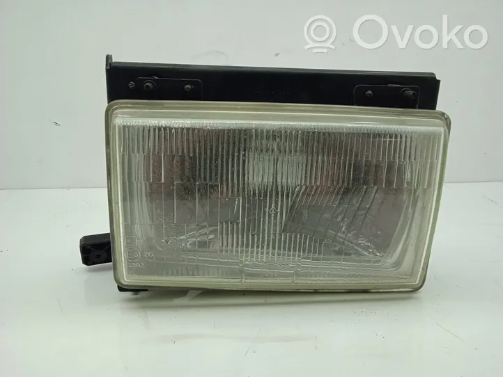 Peugeot J5 Lampa przednia SINREF