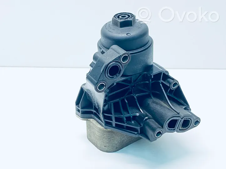 Volkswagen Golf VII Supporto di montaggio del filtro dell’olio 03N115389A