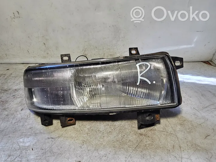 Renault Master II Headlight/headlamp 7700352104