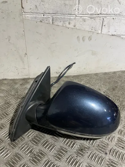 Volkswagen PASSAT B6 Front door electric wing mirror E1010781