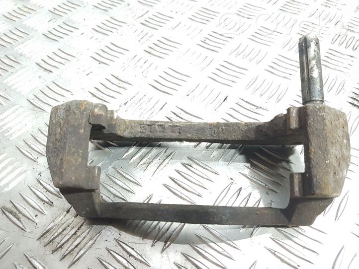 Mazda 323 Plaquette / support d'étrier avant 