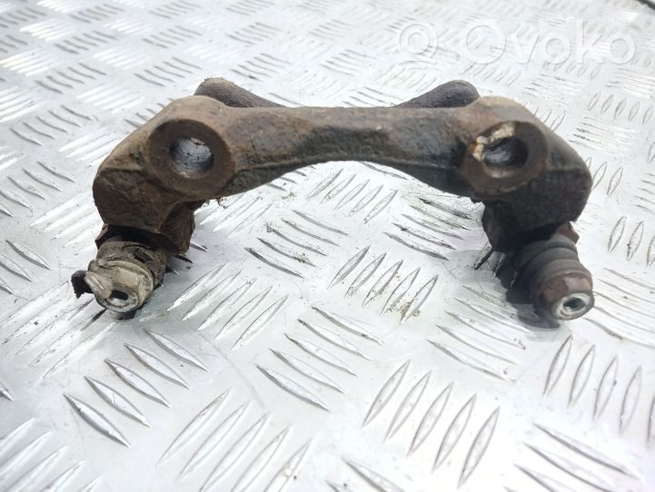 Volkswagen PASSAT B4 Plaquette / support d'étrier avant 