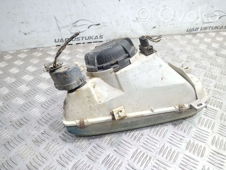 Volkswagen Golf III Lampa przednia 1H6941015N