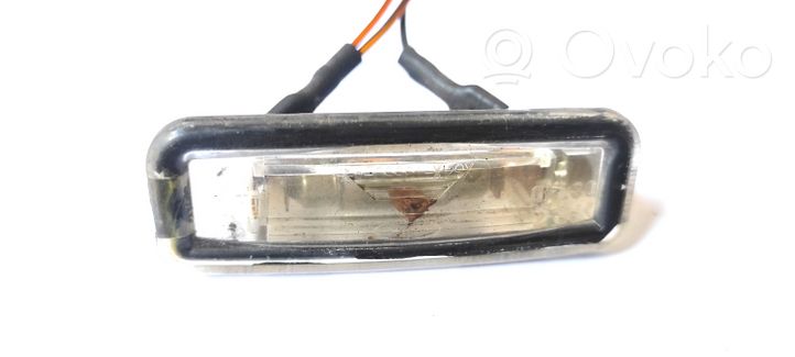 Ford Focus Lampa oświetlenia tylnej tablicy rejestracyjnej XS4X13550A