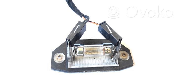 Ford Mondeo Mk III Lampa oświetlenia tylnej tablicy rejestracyjnej 1S7113550AC