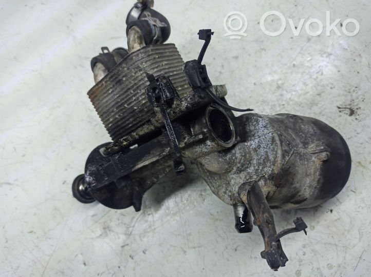 Opel Astra H Supporto di montaggio del filtro dell’olio 8973729421