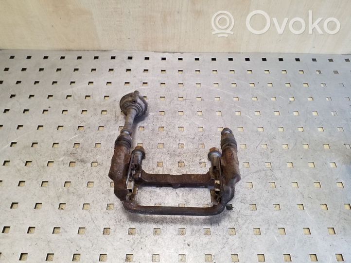 Opel Astra J Supporto della pinza del freno posteriore 