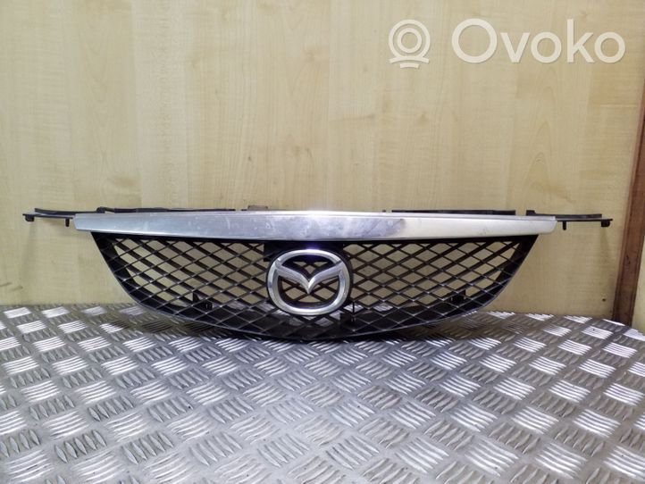 Mazda Premacy Maskownica / Grill / Atrapa górna chłodnicy C10050712