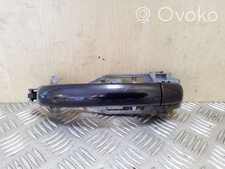 Volkswagen Touareg I Front door exterior handle 7L0837885E