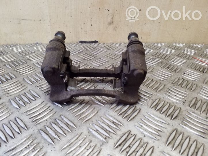 Hyundai ix35 Supporto della pinza del freno posteriore 