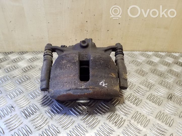 Volkswagen PASSAT B8 Caliper de freno delantero 