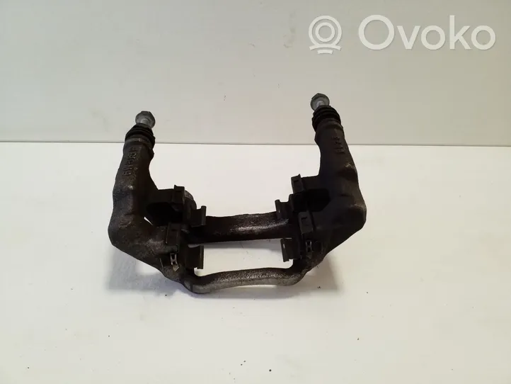 Nissan Qashqai J12 Supporto della pinza del freno posteriore 