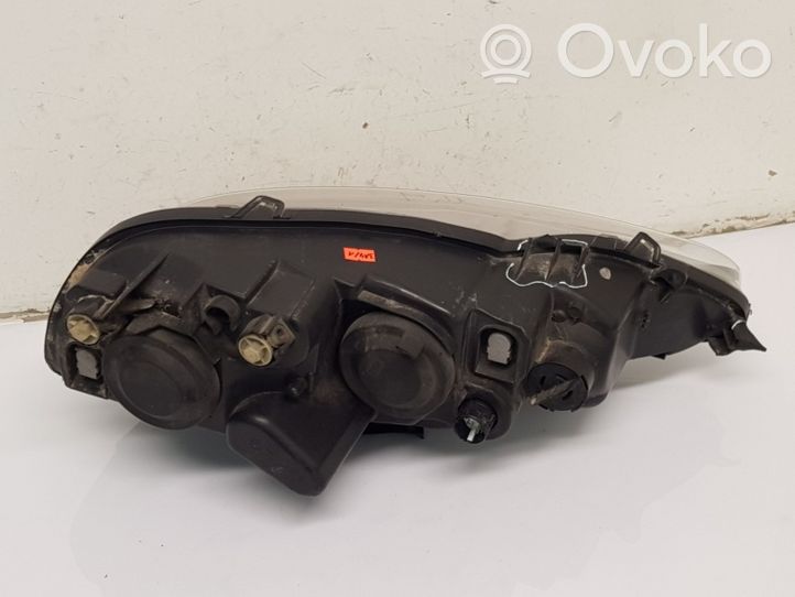 Alfa Romeo 147 Lampa przednia 89101232SX