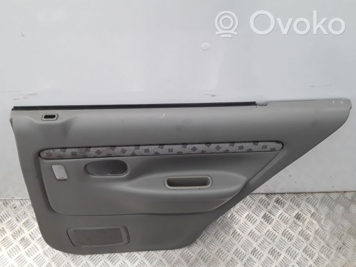 Mazda Demio Garniture panneau de porte arrière D28068520