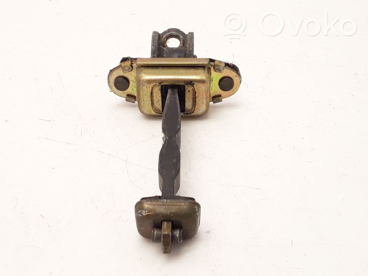 Ford Mondeo Mk III Tope freno de puerta delantera 210303