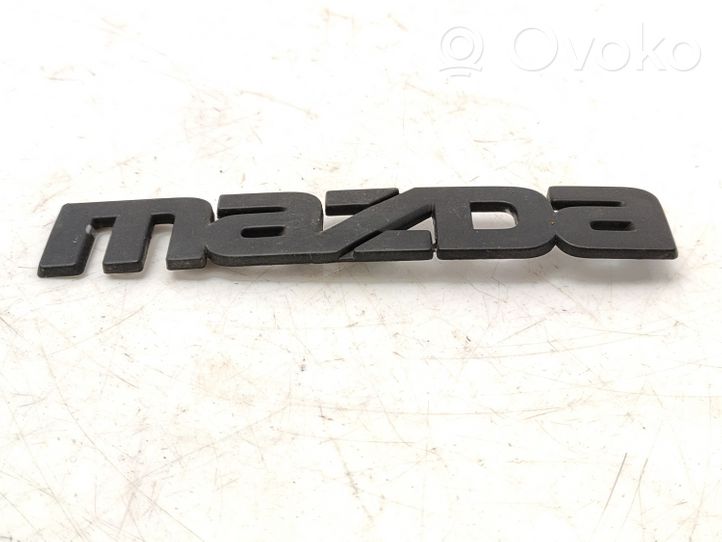 Mazda 929 Mostrina con logo/emblema della casa automobilistica H26151711