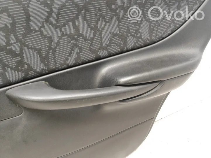 Mazda 626 Rivestimento del pannello della portiera posteriore GE4T520J57