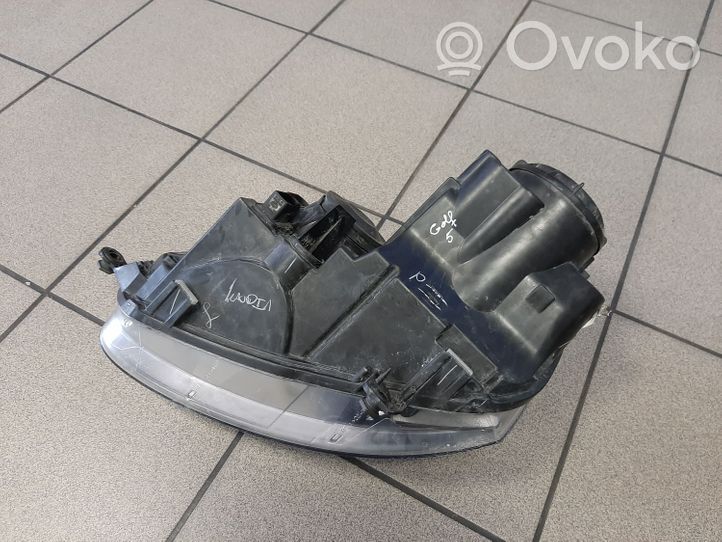 Volkswagen Golf V Lampa przednia 1K6941006P