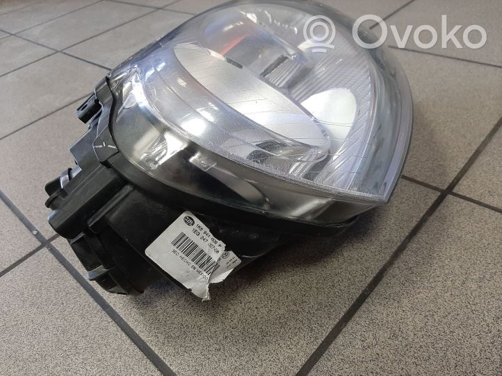 Volkswagen Golf V Lampa przednia 1K6941006P