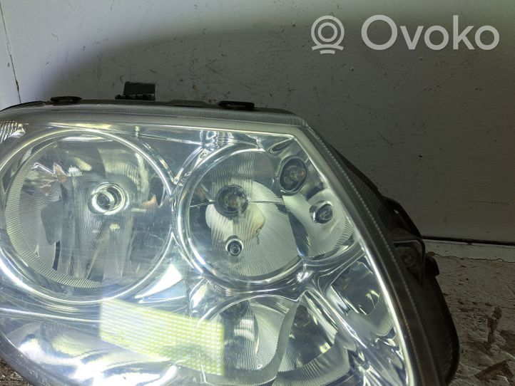 Chrysler Voyager Lampa przednia 04857830AC