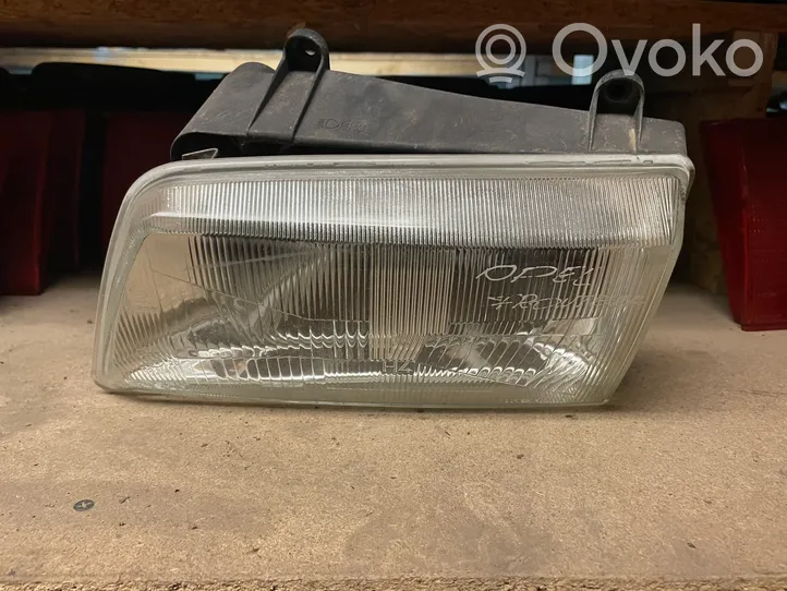 Opel Frontera A Lampa przednia 1305621507