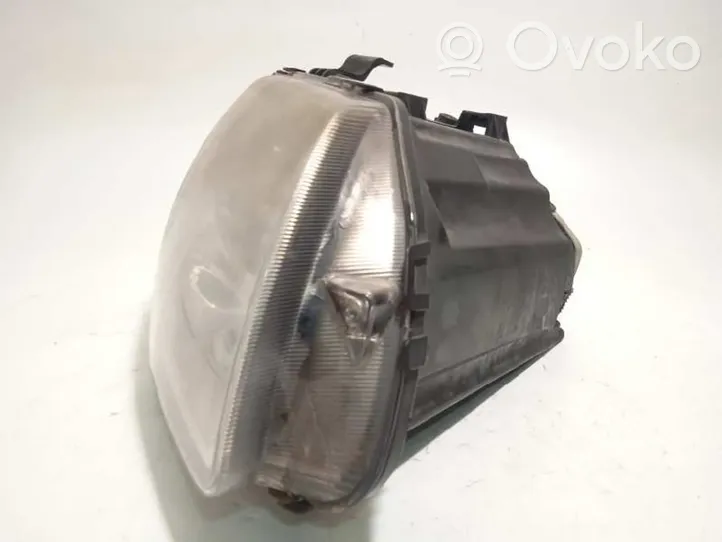 Chrysler Voyager Lampa przednia 04857830AC