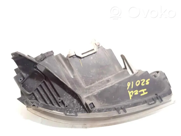 Opel Corsa C Lampa przednia 13100535