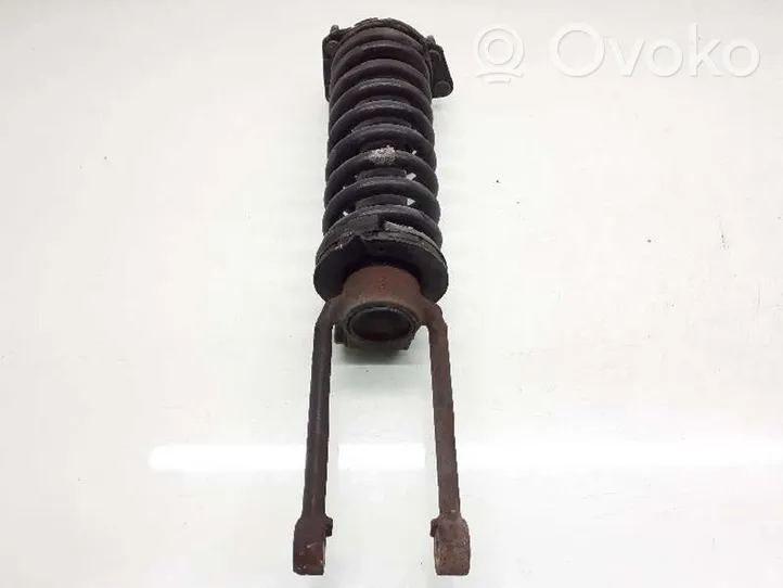 Jeep Cherokee III KJ Front shock absorber with coil spring 52128532AA