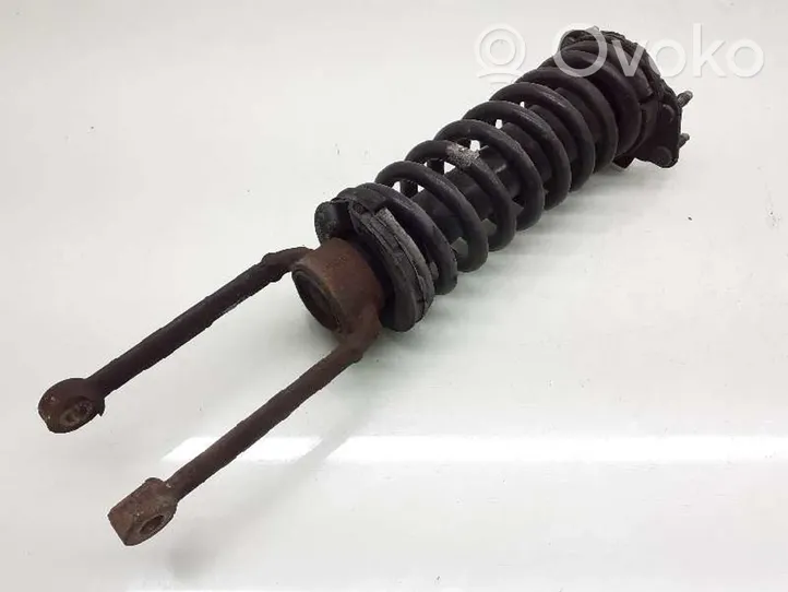 Jeep Cherokee III KJ Front shock absorber with coil spring 52128532AA