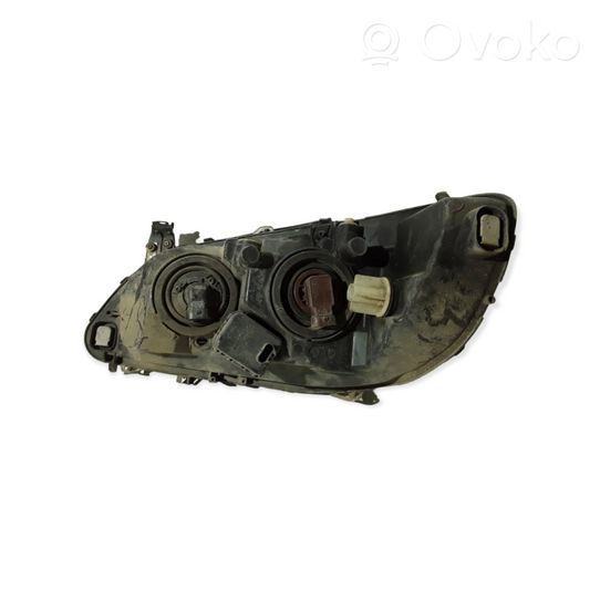 Opel Zafira A Lampa przednia 89100055