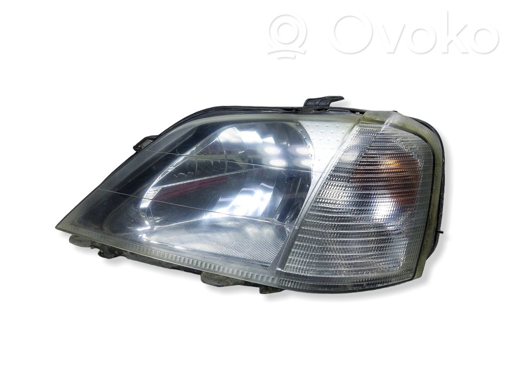 Dacia Logan I Headlight/headlamp 