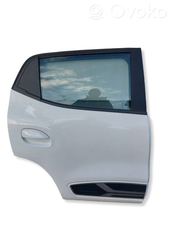 Dacia Spring Puerta trasera 