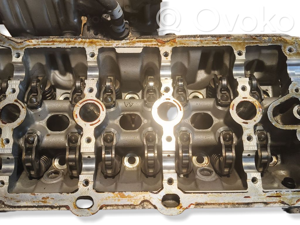 Engine head   06K403AE