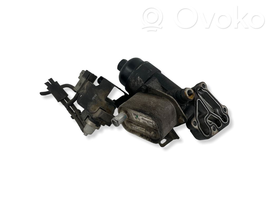 Oil filter mounting bracket   264102A650,989114W
